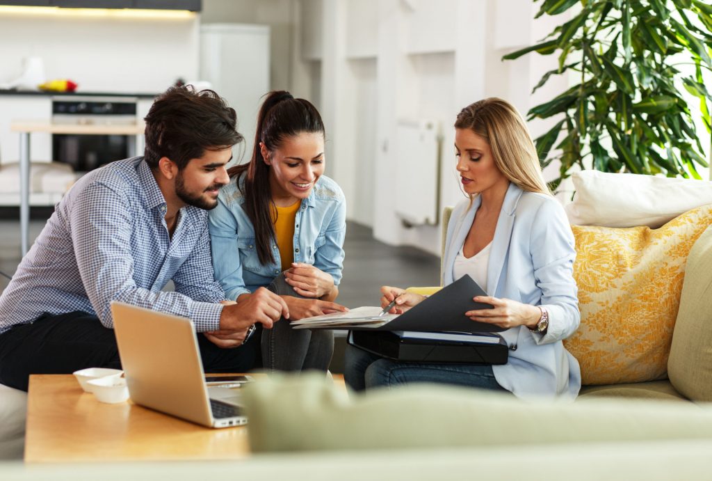 Agent Explaining Contract to Couple