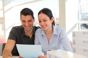 Couple Getting Real Estate Rebate