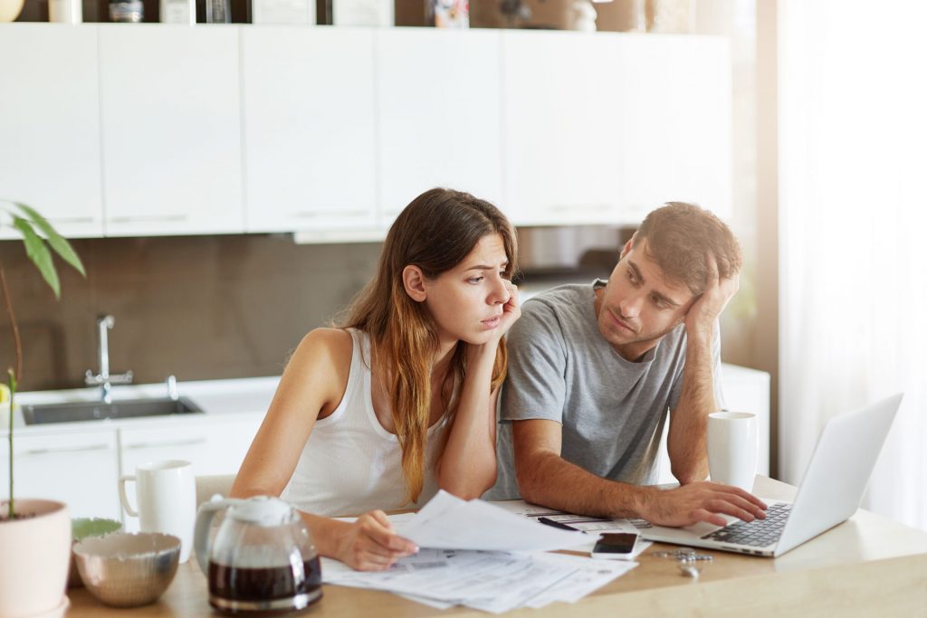 Distressed Real Estate Seller Couple