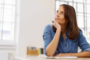 Woman Thinking About Mortgage