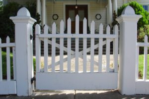 White Picket Fence Portraying a Property With Clear Title