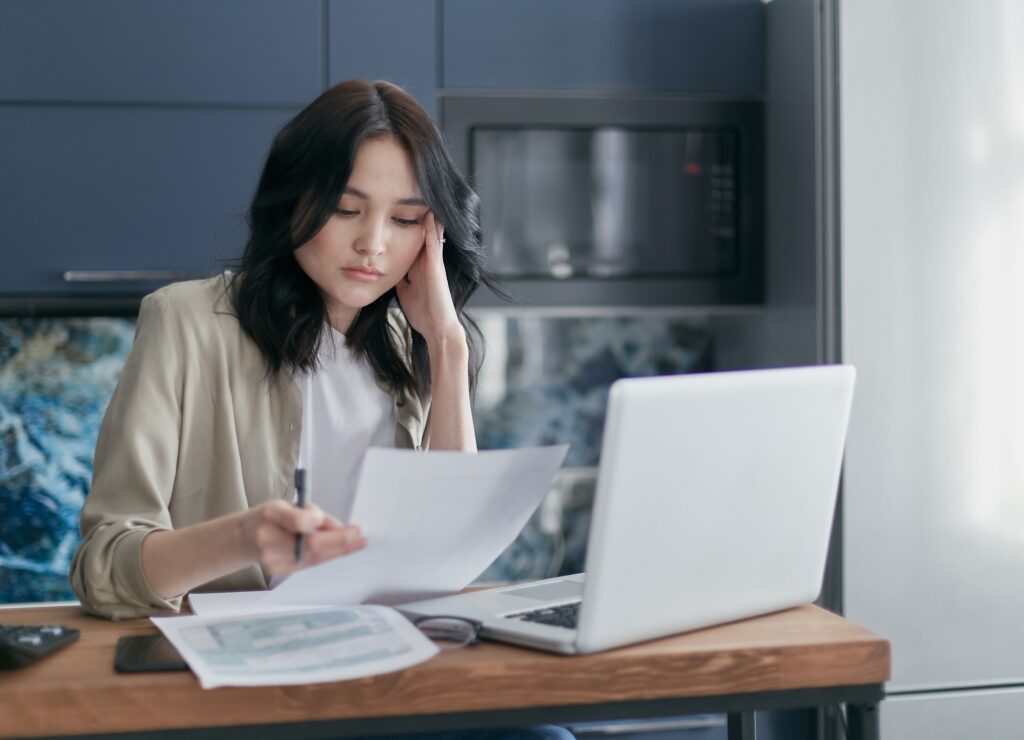 Woman Reviewing Mortgage